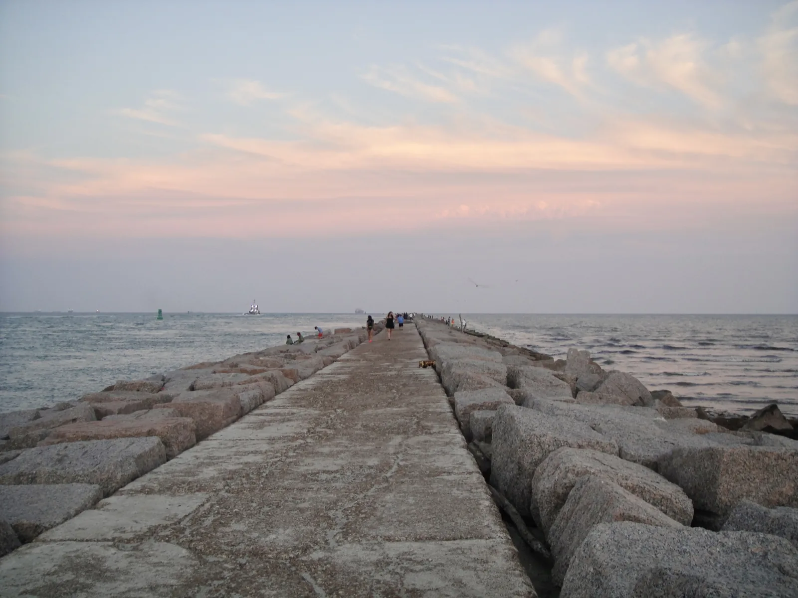 Rock-lined South Jetty extending toward the Gulf of Mexico at Port Aransas